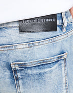 Omar Slim Ripped Jeans
