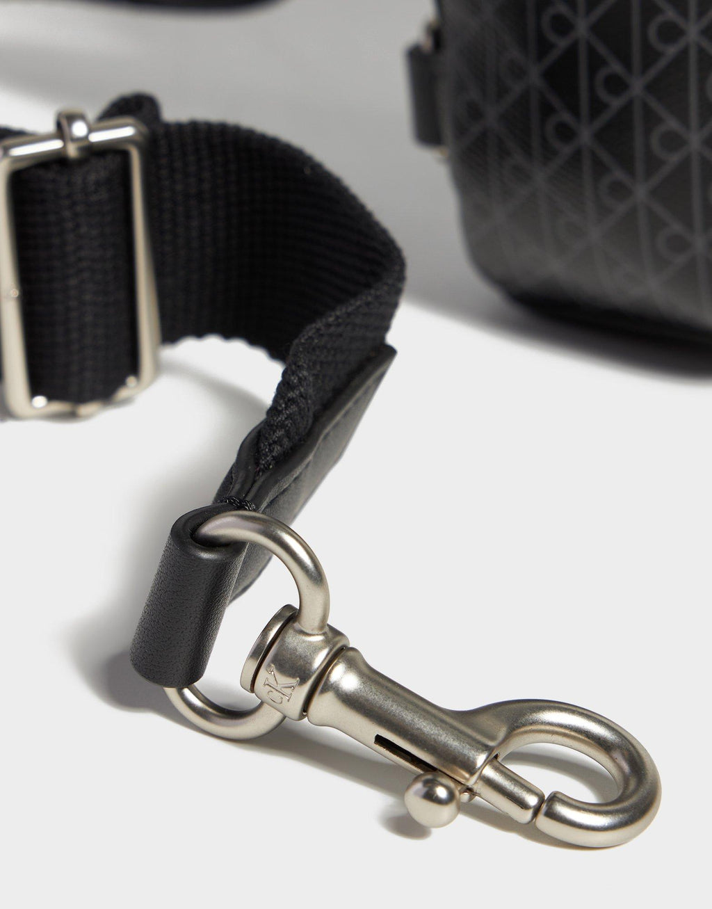 Monogram Emblem Sling Bag