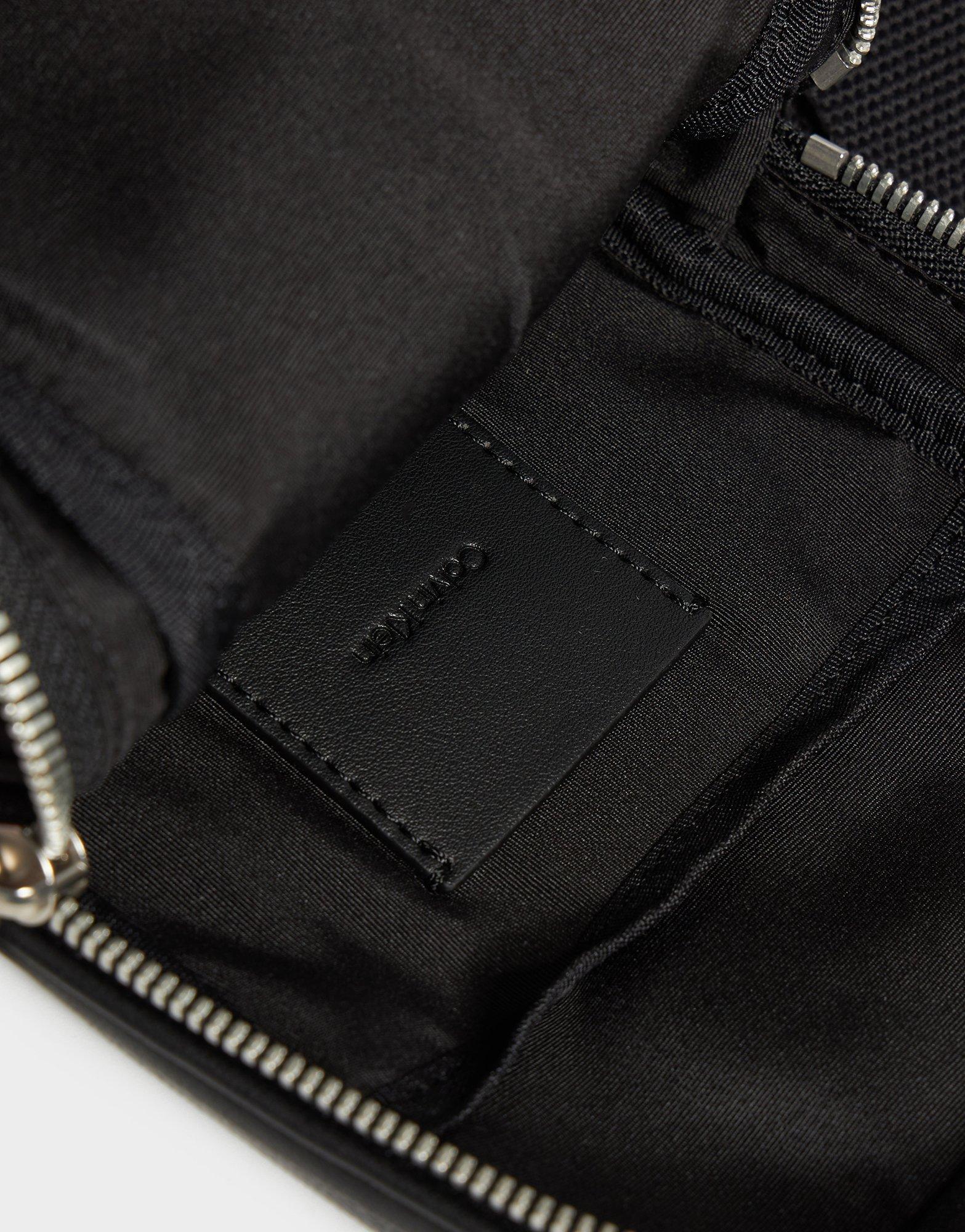 Monogram Emblem Sling Bag